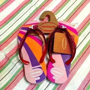 HAVAIANAS Childs size 10 Glow Flip Flops NWT